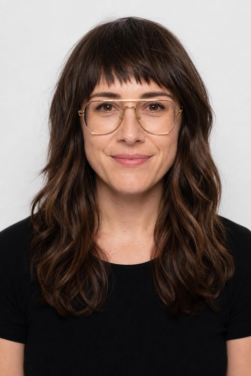 Choppy Textured Fringe with Gold Aviator Glasses on Wavy Brown Hair