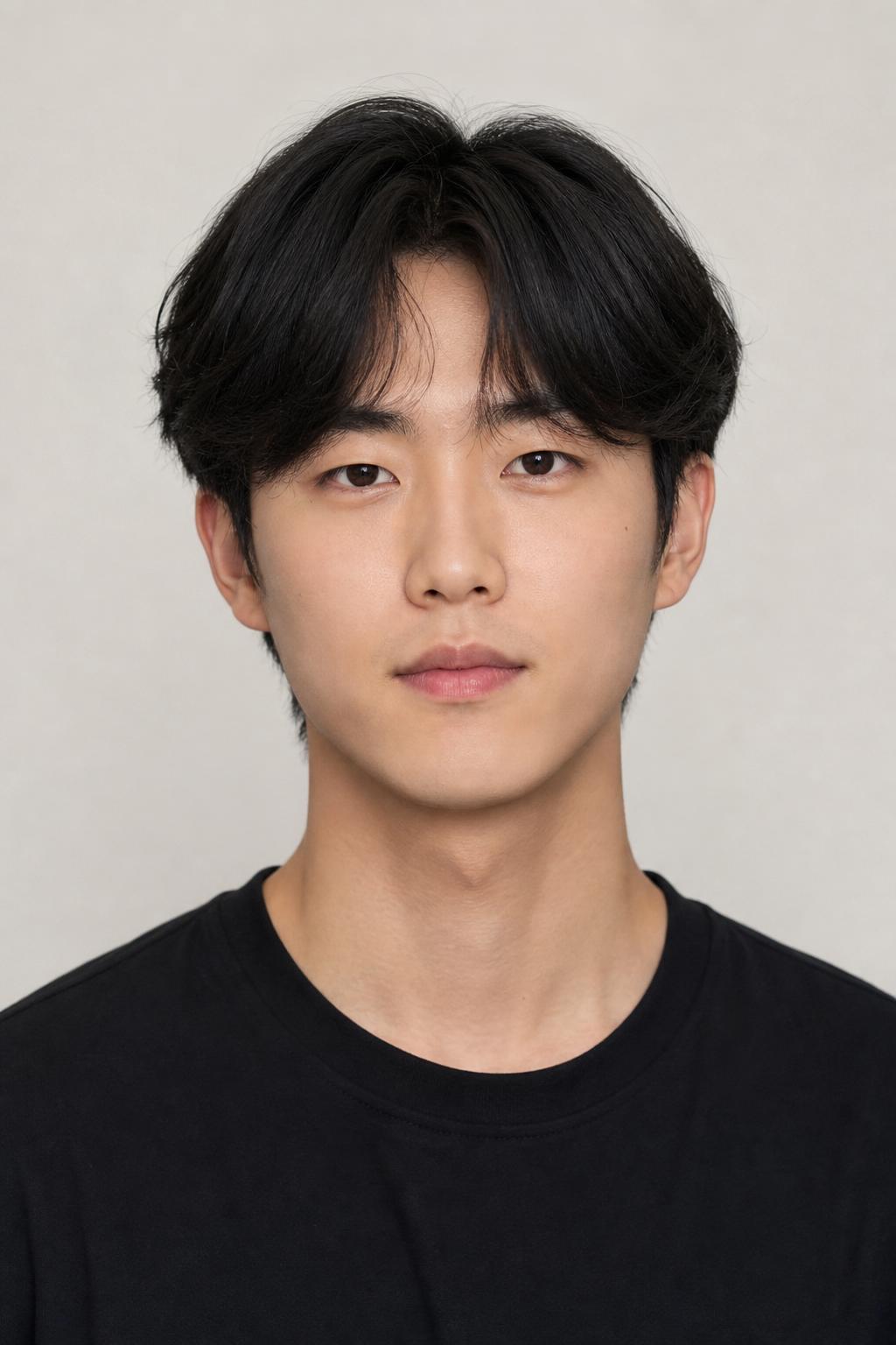 Korean Fluffy Hair with a Soft Airy Middle Part on a Young Man