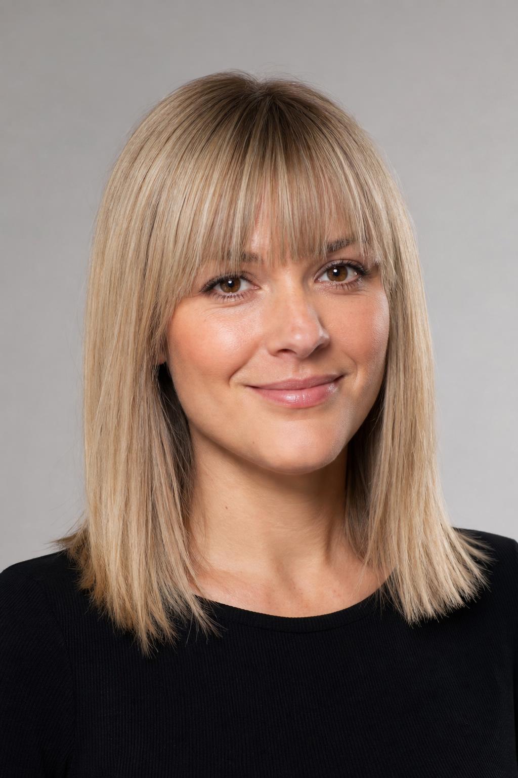 Neat Soft French Fringe Freshly Styled on Fine Ash Blonde Hair