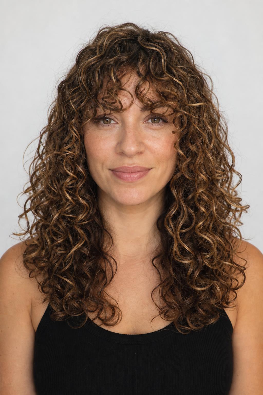 Face-Framing Fringe Merging into Long Grown-Out 3A Curls