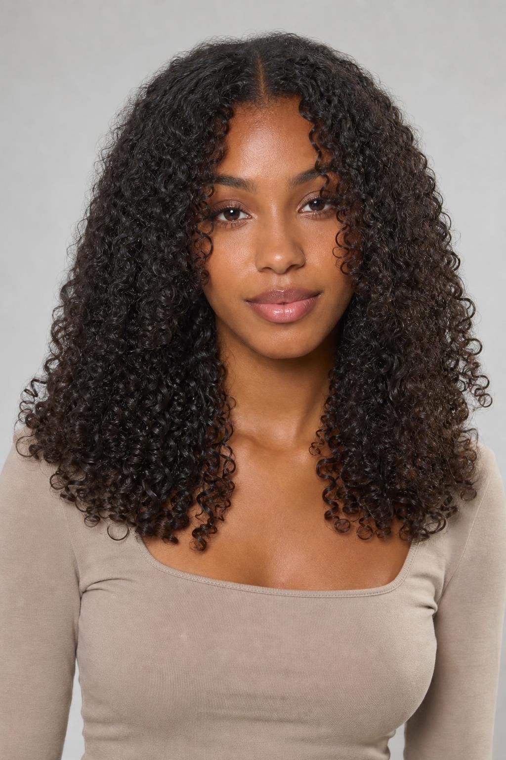 Curly Butterfly Cut with a Distinct Chin-Length Top Layer