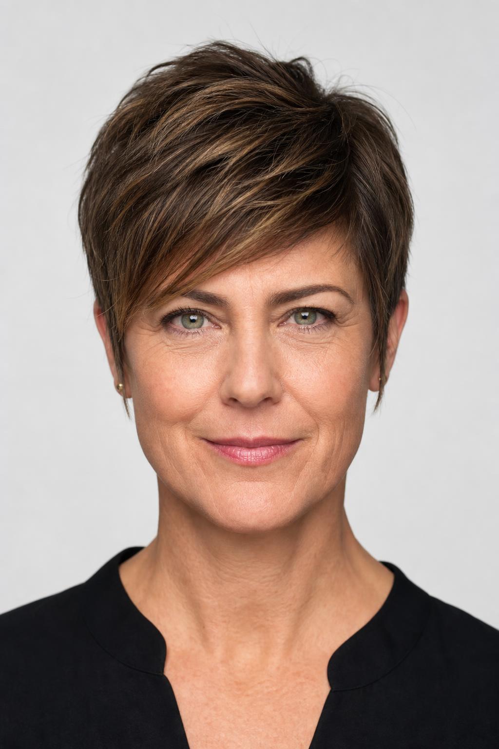 Short Cut Swept Diagonally Across the Forehead with Length at the Ears