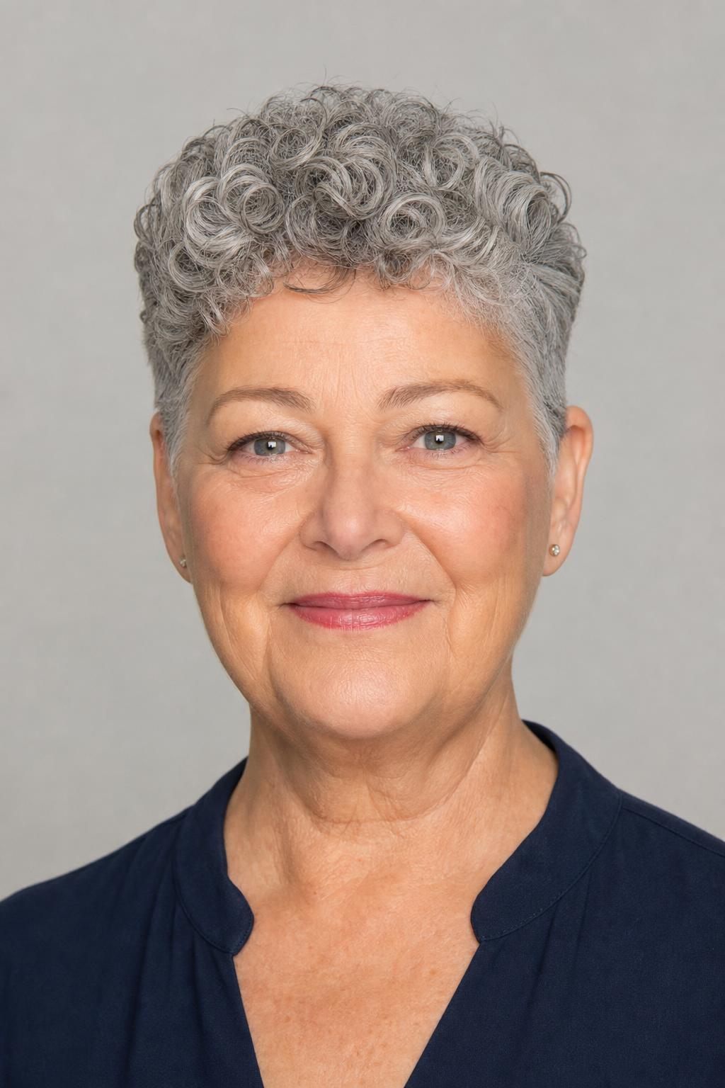 Rounded Curly Crop with Close Sides and Height above the Forehead on a Round Face