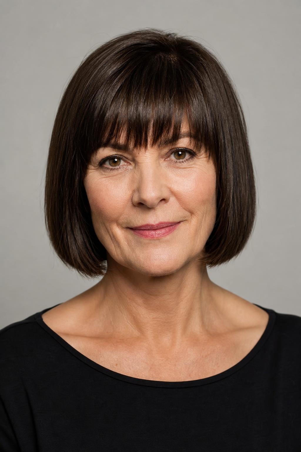 Chin-Length French Bob with a Blunt Perimeter and Eyebrow-Grazing Fringe