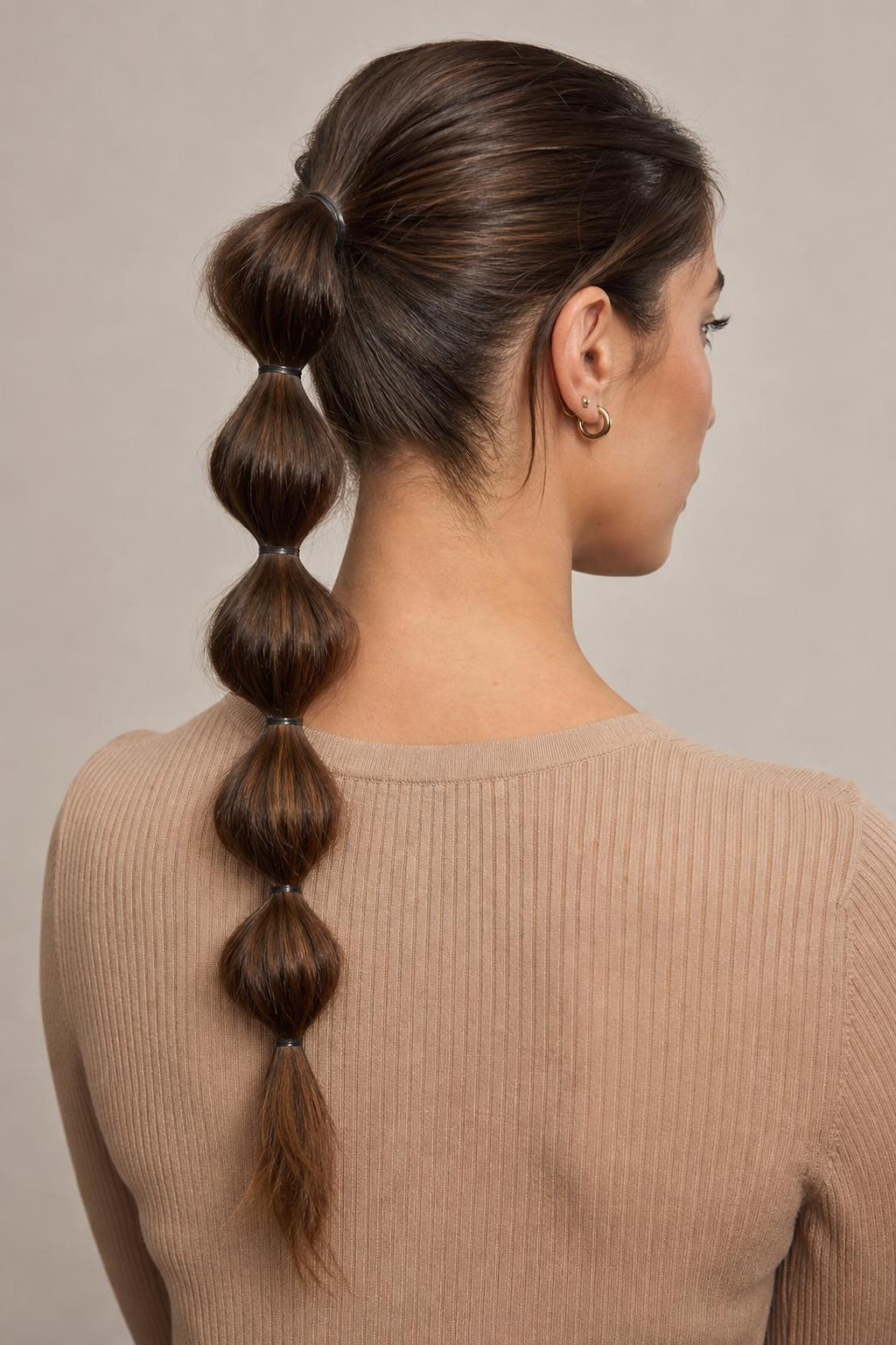 Bubble Ponytail with Elastics Spaced Down the Length and Rounded Segments