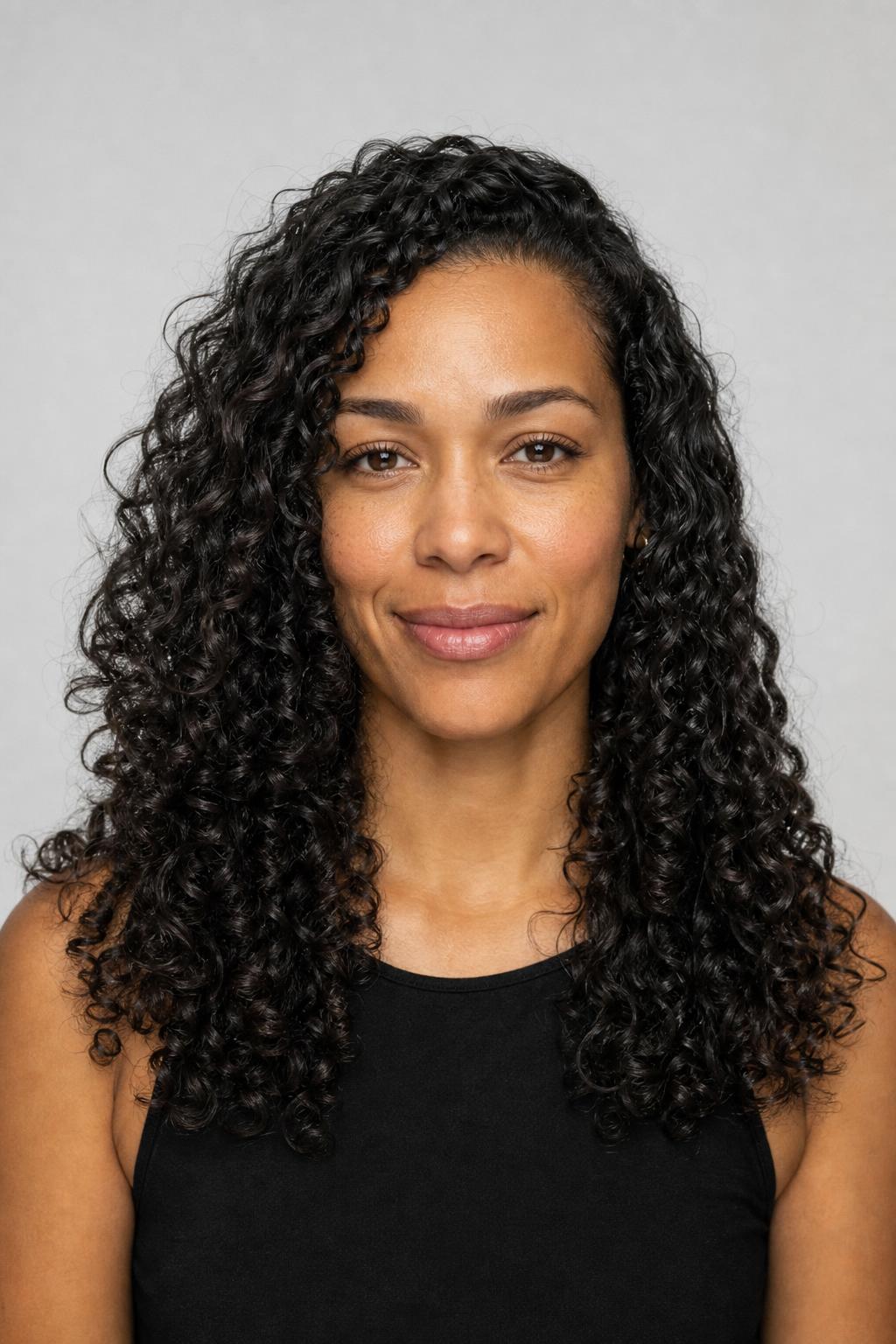 Long Curly Hair with Widely Spaced Layers and Defined 3B Curls on Dark Hair