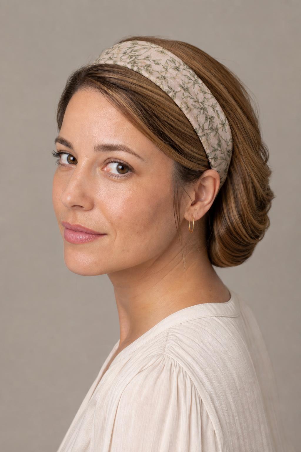 Long Hair Rolled and Tucked Around a Wide Fabric Headband at the Nape
