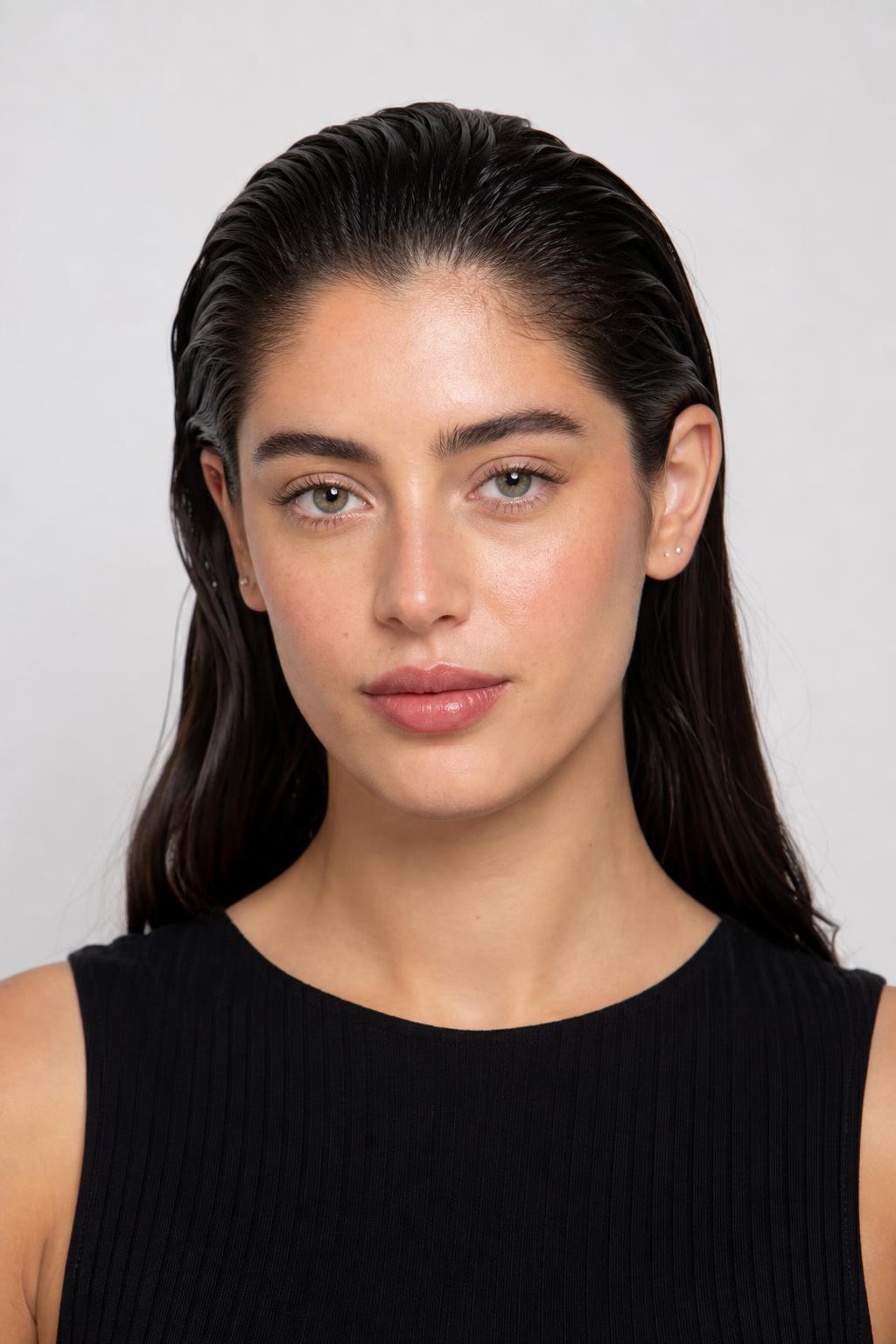 Long Hair Slicked Straight Back from the Hairline with a Glossy Wet Finish