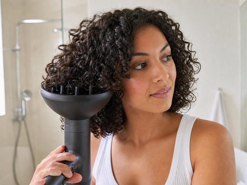 Diffusing Defined Dark Brown 3b Curls with a Bowl Diffuser Attachment at Shoulder Length