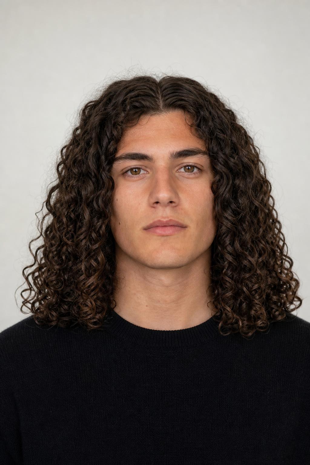 Long Even Curls Kept at One Length with Clean Ends on Dark Brown Hair