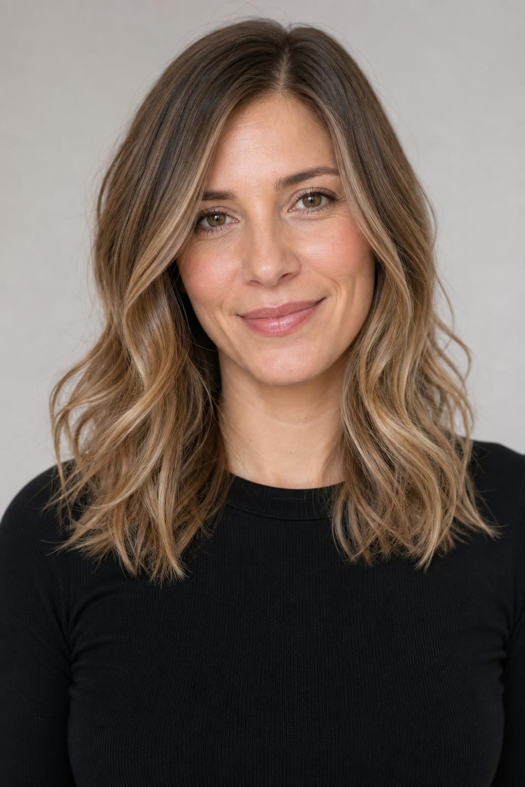 Mousy Roots Warming Gradually into a Soft Bronde