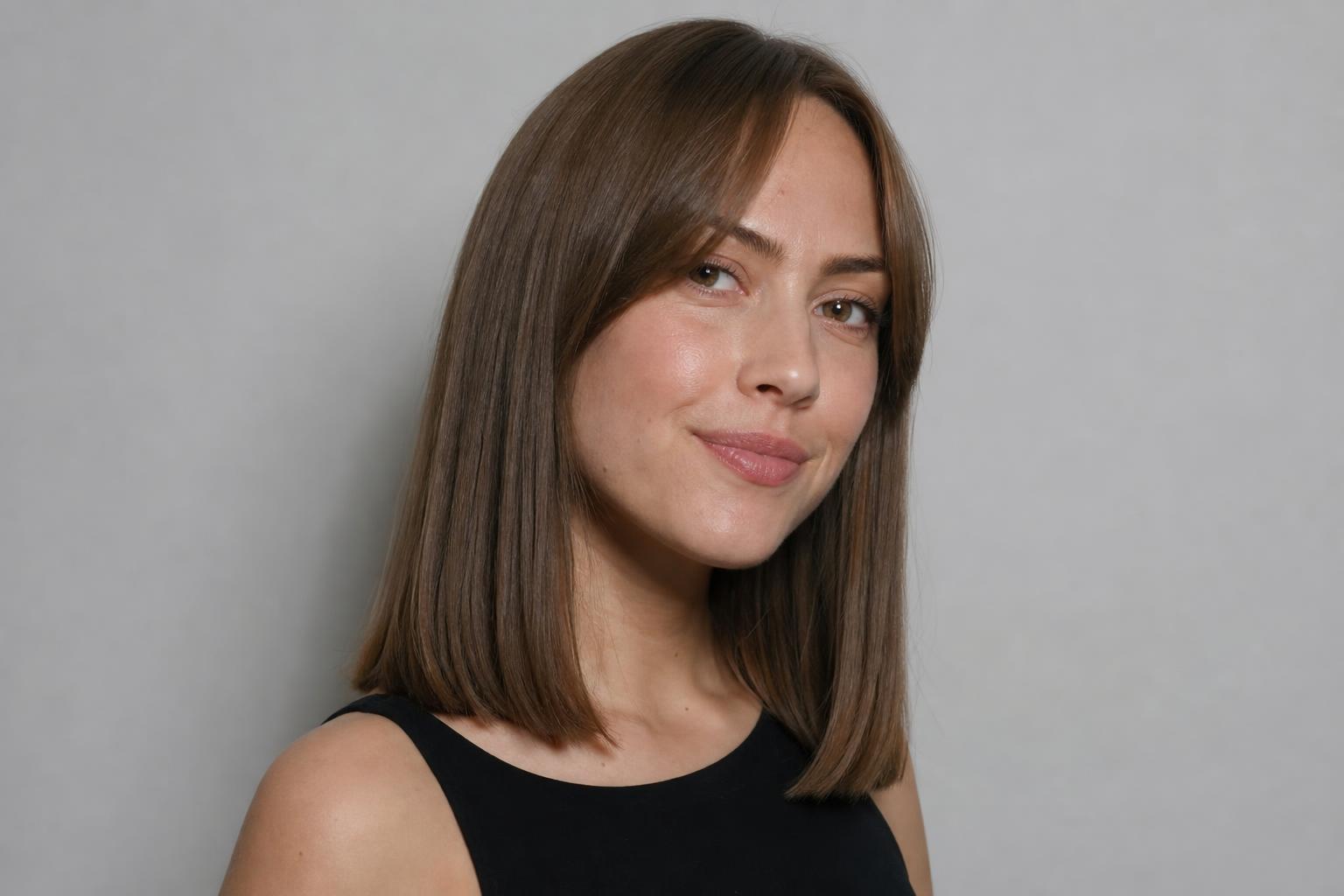 Collarbone-Length Blunt Cut with Soft Curtain Bangs on Fine Brunette Hair