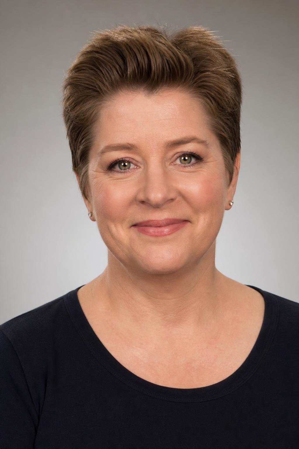 Feathered Pixie with Height at the Front and Flat Temples on Medium Brown Hair