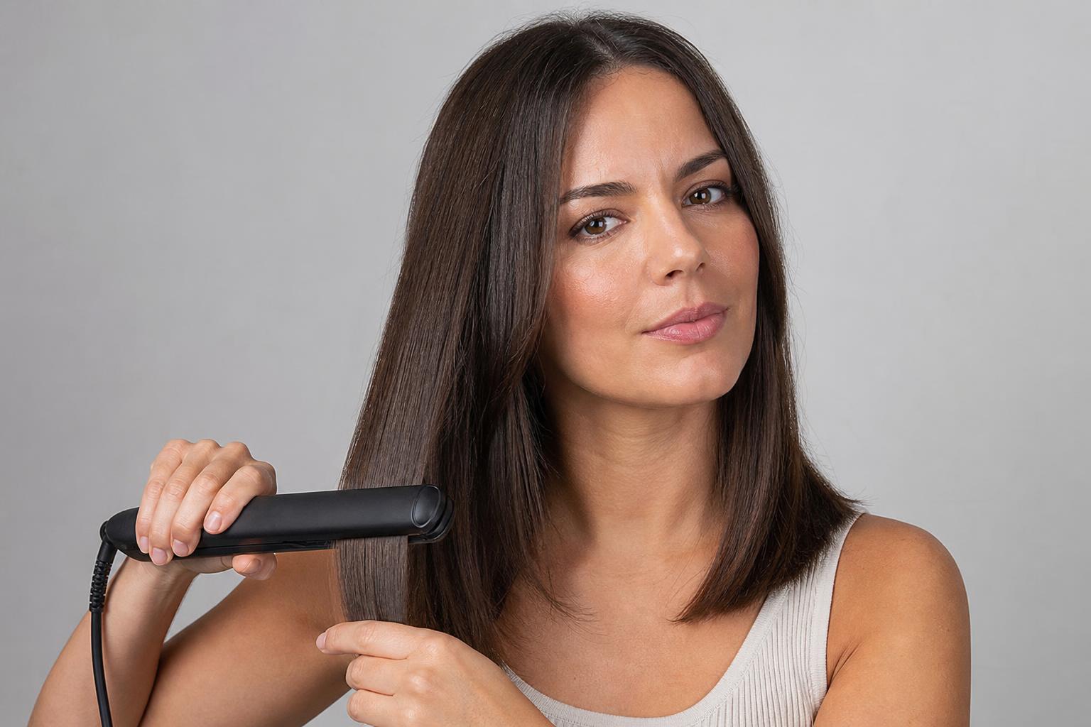 Smooth Straightened Shoulder-Length Brunette Hair Styled with a Ceramic Flat Iron