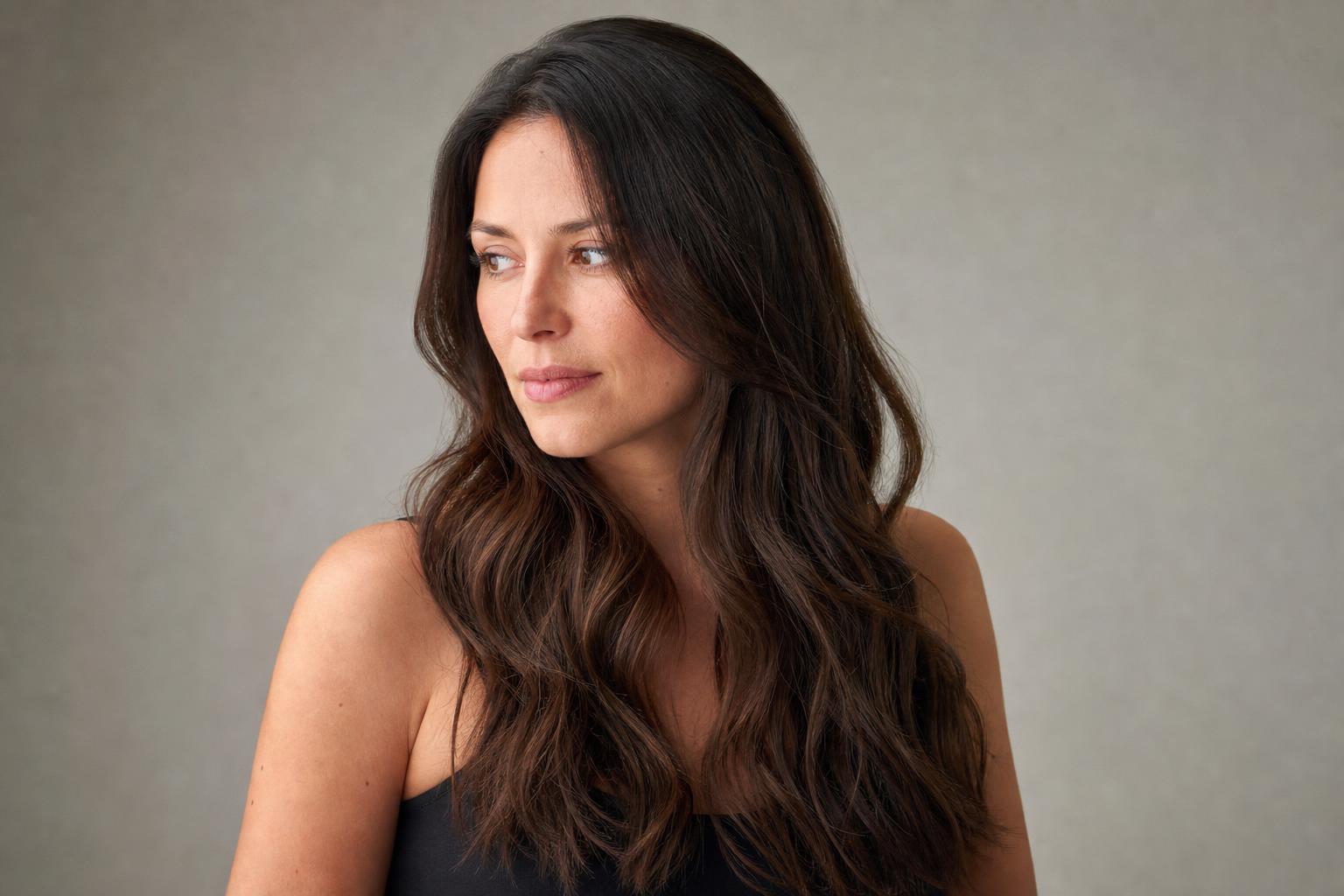 Freshly Washed Long Dark Wavy Hair with a Smooth Cuticle and Natural Sheen