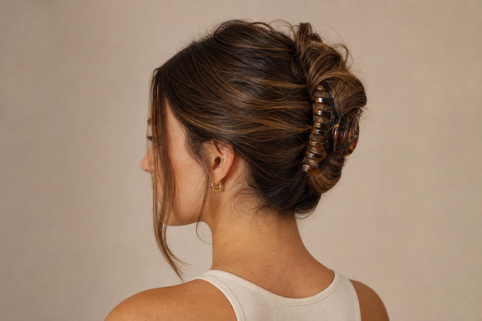 Long Brown Wavy Hair Twisted Up and Held by a Large Tortoiseshell Claw Clip