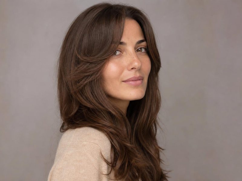 Long Layered Hair with a Curtain Fringe and Chin-Length Face-Framing Pieces on Thick Wavy Brown Hair